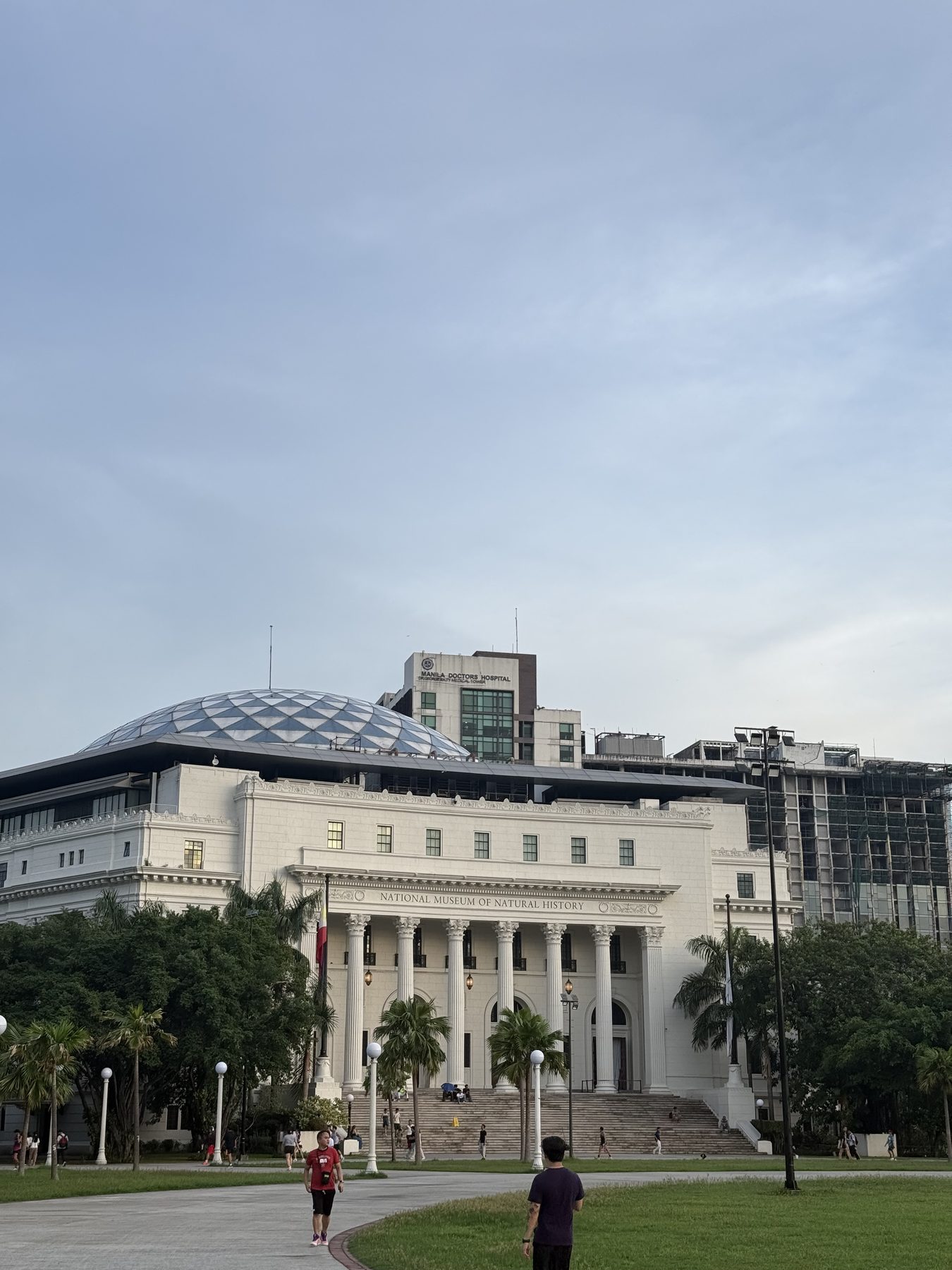 National Museum of Natural History in Manila beneath a wide blue sky